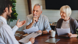 A couple meets with an attorney to discuss a Trust. Texas attorney Jennifer Nichols can help with estate planning. 